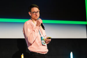 Man with microphone on a stage