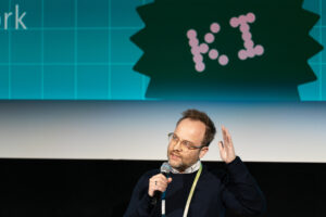 Man with microphone on a stage